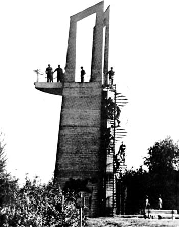 Photo: V Corps soldiers visit the "Freedom Tower" located on a hill overlooking the inner-German boundary. The "Freedom Tower" was used during the first year of the Border Tour Program in 1972.