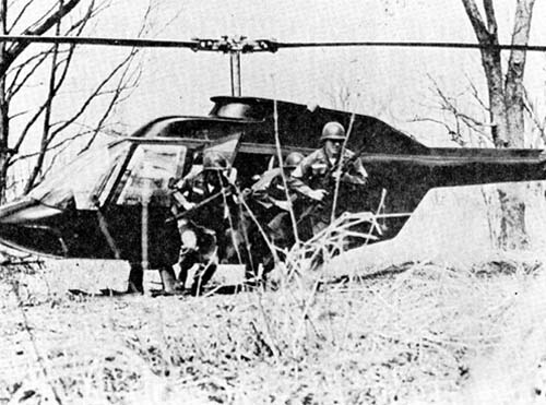 Photo: Soldiers being inserted along the border as a test of unit readiness. aircraft is an OH-58 Kiowa.