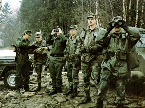 Photo: A German Federal Border Guard patrol company observations with a 2d Armored Cavalry Regiment border patrol. March 1983.